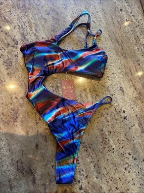 Cupshe Multicolor One-Shoulder Cutout Swimsuit in Blue, Teal & Orange Wave Print